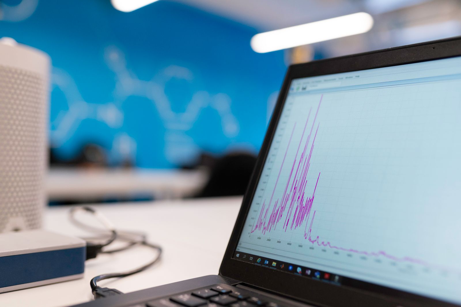 Laptop screen showing an analytics dashboard used to track Google AI Overview ranking performance