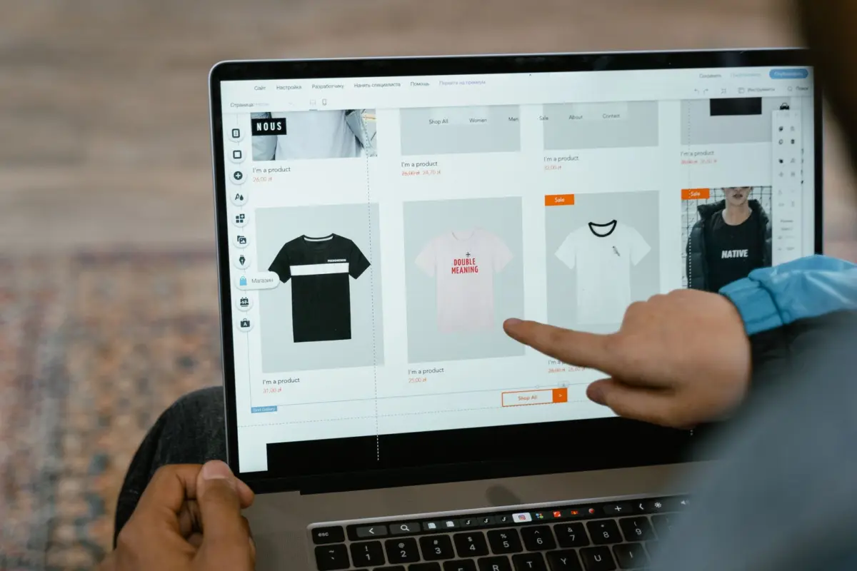 Online shop product pages on a laptop, part of an eCommerce website build timeline