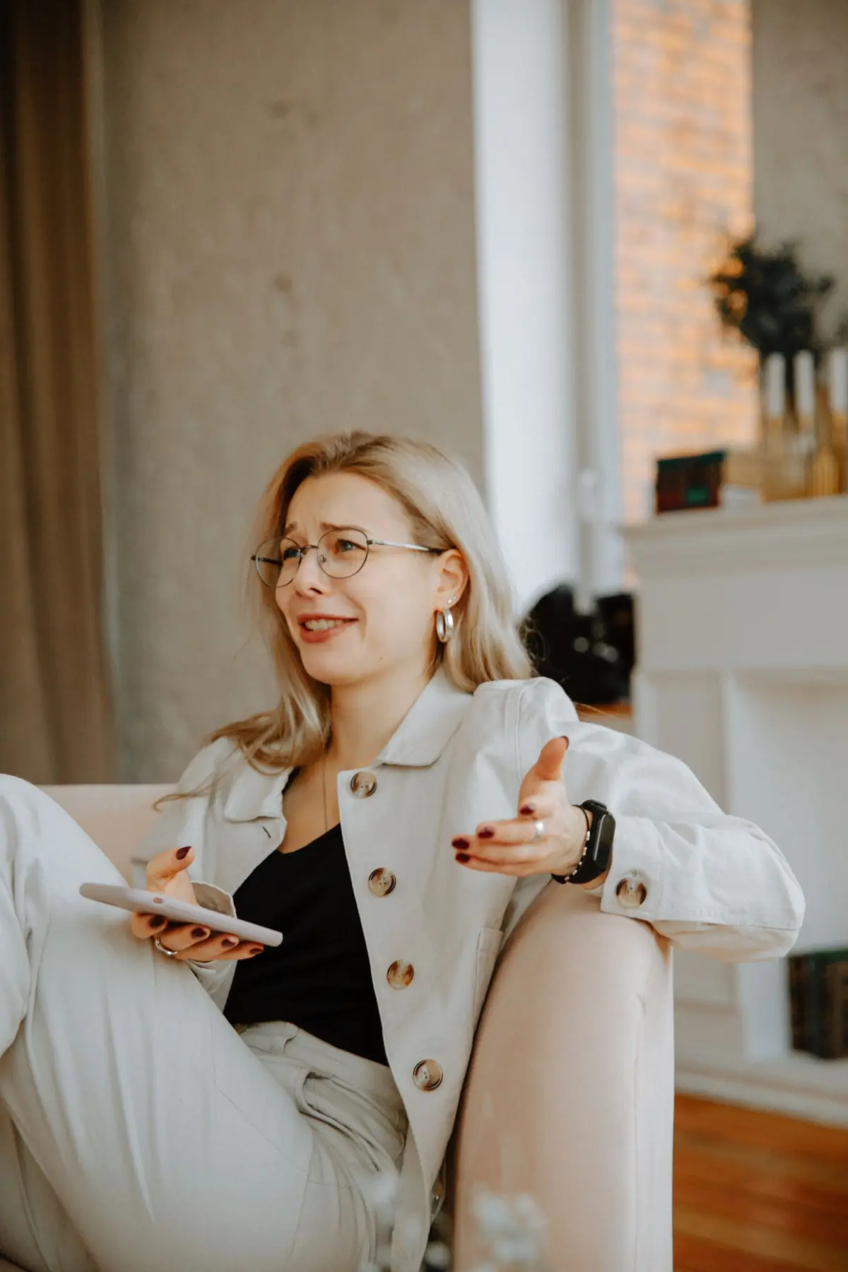 Surprised woman looking at her phone because her Google review is not showing