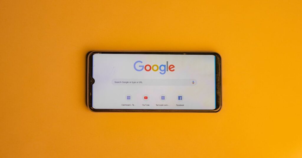 Smartphone showing Google search, where AI Overviews now answer questions