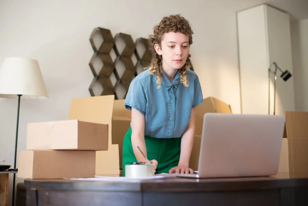 Small business owner working on her laptop to improve how her website ranks on Google